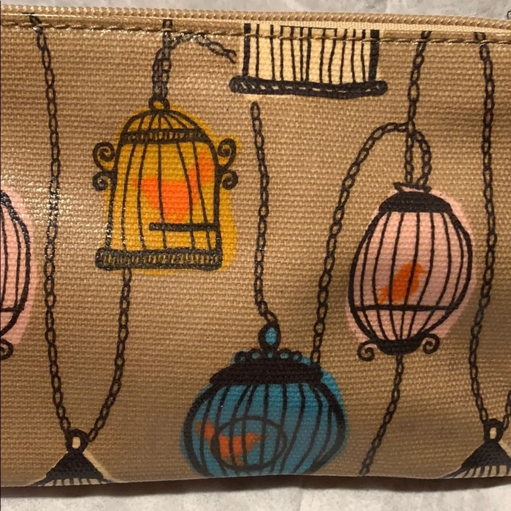 Birdcage chains cosmetic pouch